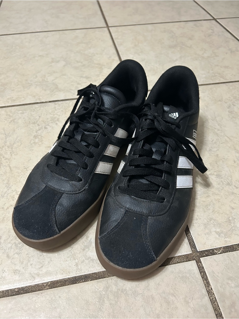Adidas Black Athletic Sneakers with White Three-Stripes